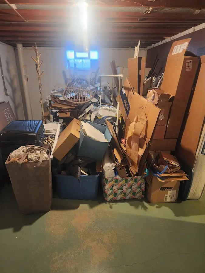 Roll-off dumpster container at job site for 20 Yard Dumpster Rental in Sugar Land